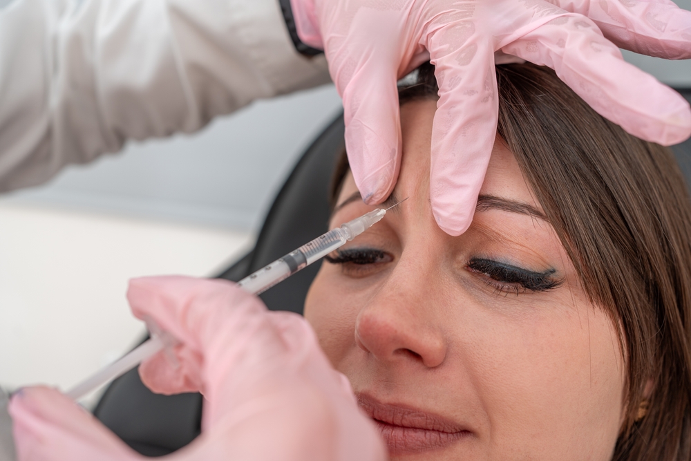 woman getting Botox for frown lines in Columbia MD