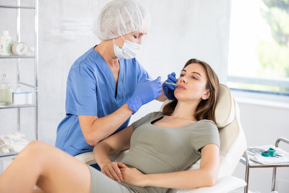 woman getting lip filler in Clarksville MD