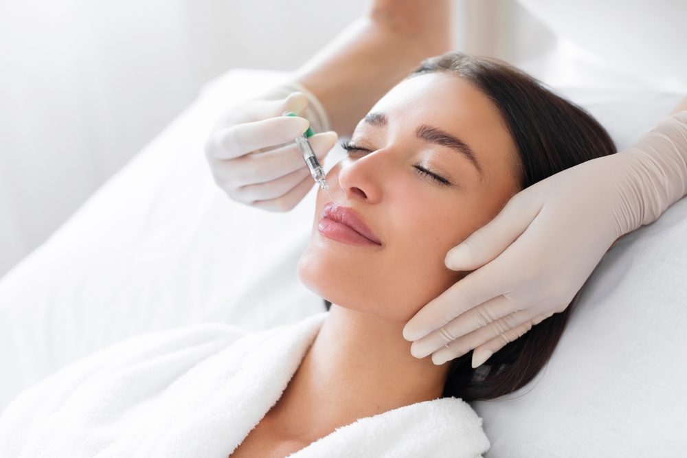 woman getting filler for lip hydration in Columbia